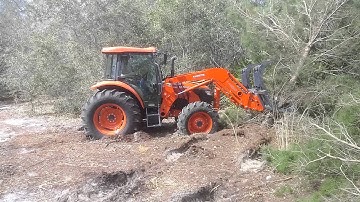 Pushing trees with Kubota M9960