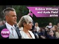 Robbie Williams and Ayda Field arrive at royal wedding