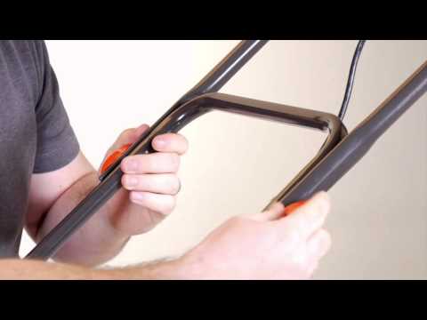 How to assemble the handles on a Flymo Chevron 34 & 37 series lawnmower.