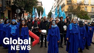 Climate protesters march in Madrid as Greta Thunberg appears at alternative summit