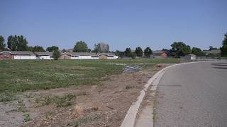 Vehicle plows through fence in front of Billings affordable housing complex