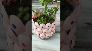 Recycling plastic bottle and plastic spoons into small garden planter Pot