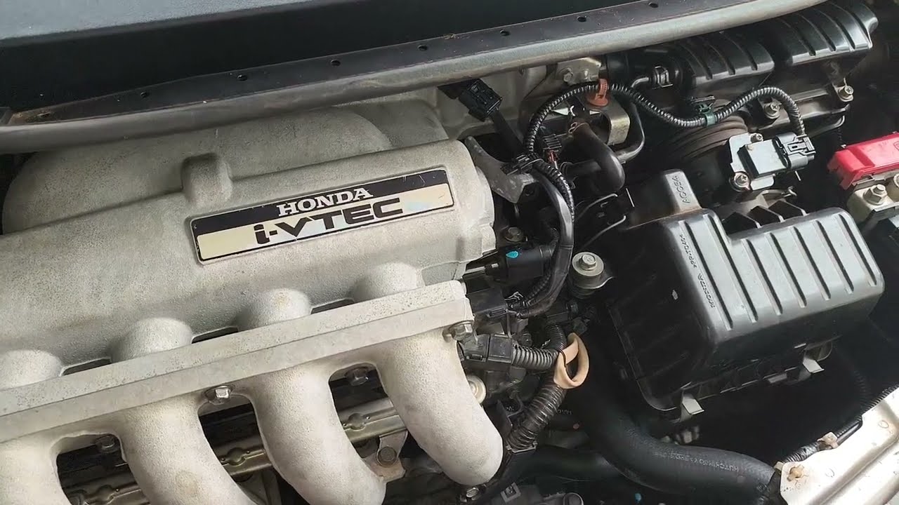 Ajuste de válvulas terminado. Motor ligado aguardando o disparo da ventoinha. Honda Fit DX MT 2013. 