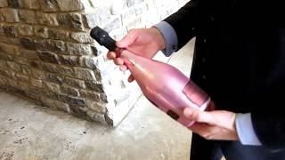 Opening a bottle of Armand de Brignac Champagne