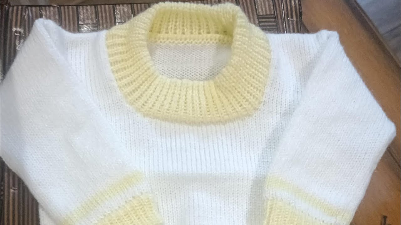 Blusinha RN na máquina de tricô. Veste até o terceiro mês.