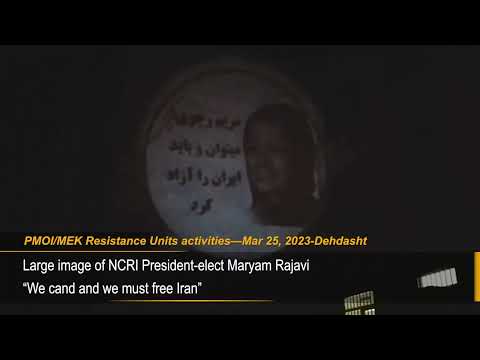 MEK Resistance units project images of Massoud and Maryam Rajavi in Dehdasht