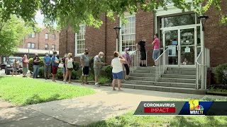 Residents line up at post office after going without mail for weeks