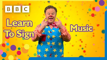 Learn to sign Music | Mr Tumble 🎶🎺🎸🎵 | Mr Tumble and Friends