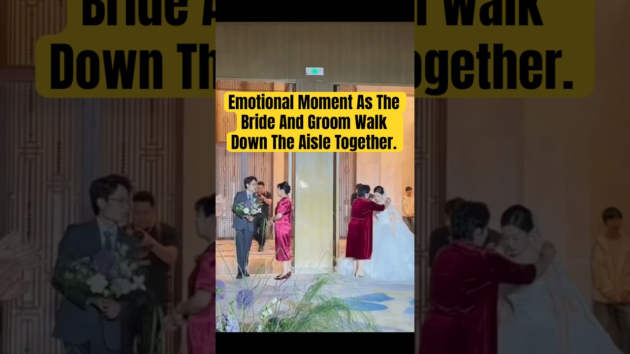 Emotional Moment As The Bride And Groom Walk Down The Aisle Together.