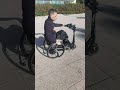 Trottinette électrique pour fauteuil roulant grâce à globe-trotter la fixation de chez omni !