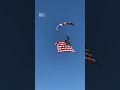 American flag snags tree, sending Folsom rodeo skydiver off course with cut lip
