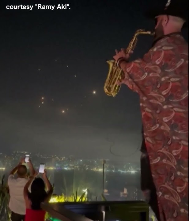 Lebanese saxophonist plays on as Iranian missiles hurtle towards Israel