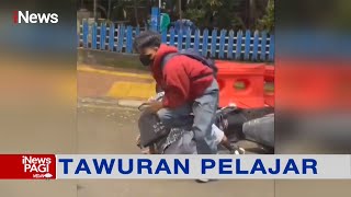 Kesal, Warga Lempar Kone Pembatas Jalan Bubarkan Tawuran Pelajar #iNewsPagi 08/01 screenshot 4