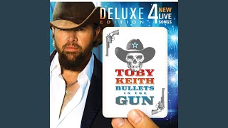 Miniatura del video "Toby Keith - Kissin' in the Rain"