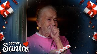 A Secret Santa surprises a stunned grandmother who walks everywhere & is raising two grandchildren