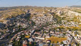 Goreme, Nevsehir, Turkey. Aerial view of the town nestled within eroded valleys and fairy chimney...