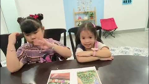 Phan Thiet English Communication: Cherry and Daisy practice reading a book "Christmas Eve"