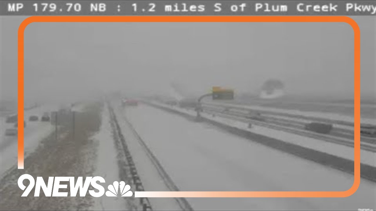 Snowstorm slows travel between Denver and Colorado Springs - YouTube