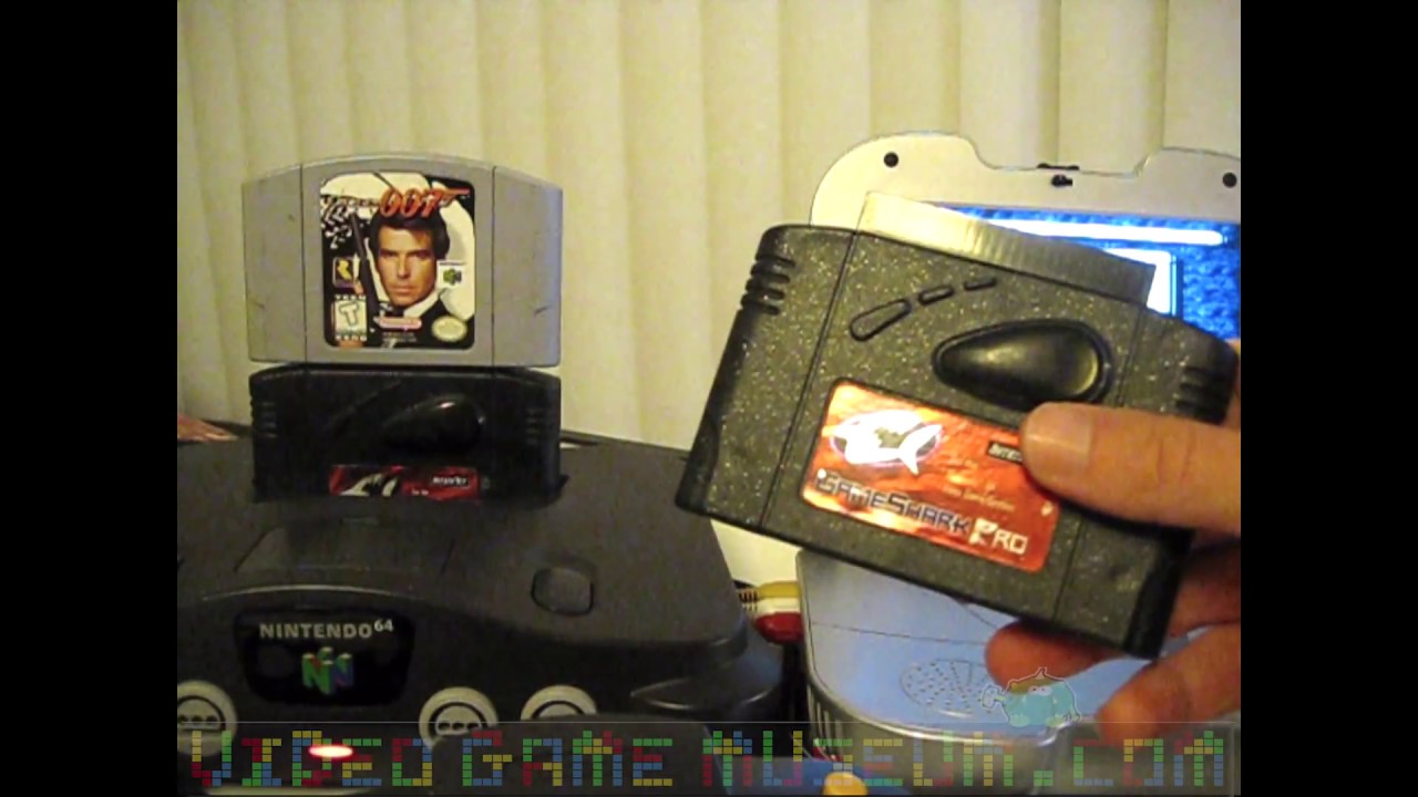How do you use the GameShark cartridge for backups? I have the lid button  taped down, and original game in, but the disc never stops spinning to  allow swapping in the backup.