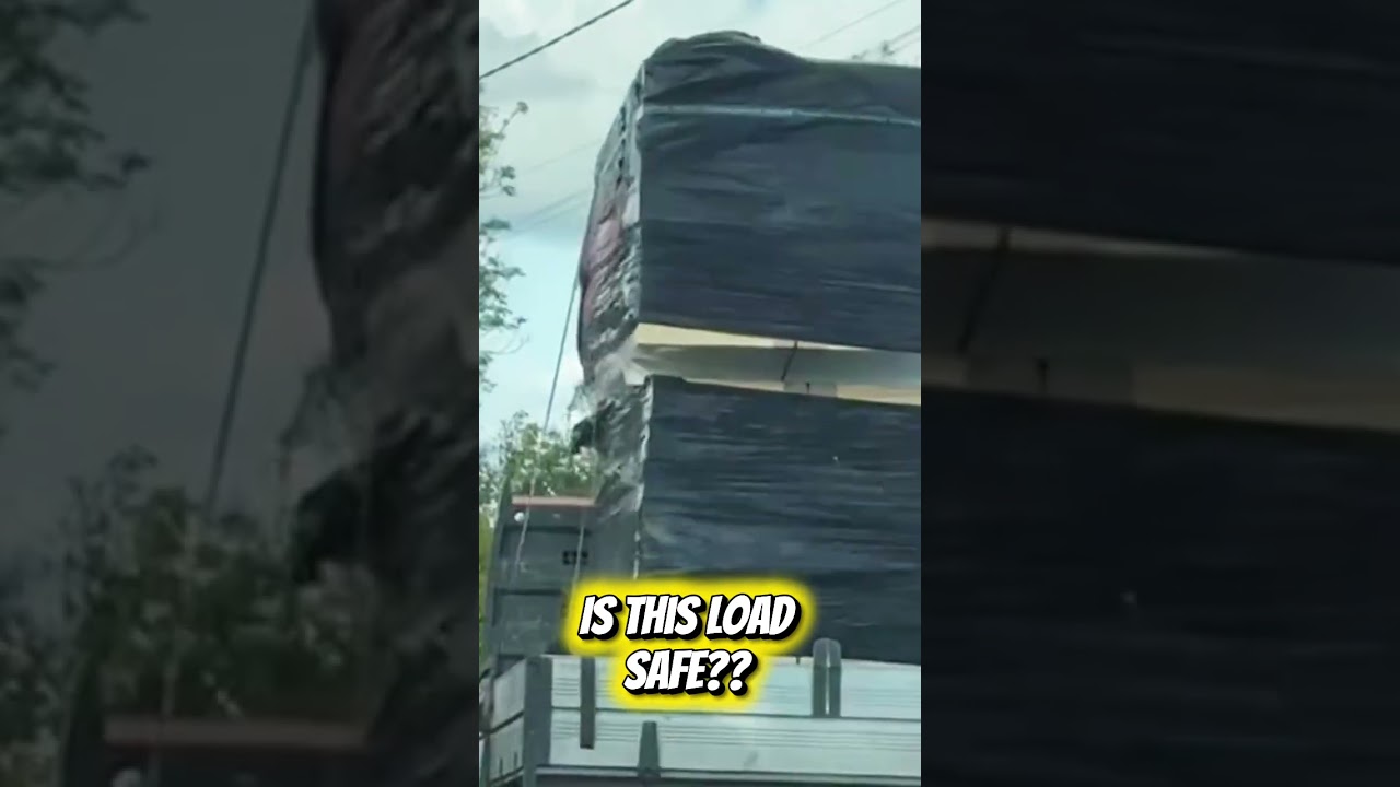 This load was spotted on the road and filmed by the passenger.  Is this a secure load??