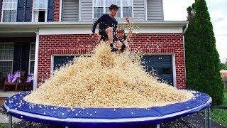 5 MILLION PIECES OF POPCORN ON TRAMPOLINE!