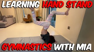 Learning how to do hand stand in gymnastics for beginners. How to start
