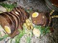 Moroccan stuffed spleen with ground beef, eggs and olives. طيحان معمر بالكفته،بيض و زيتون