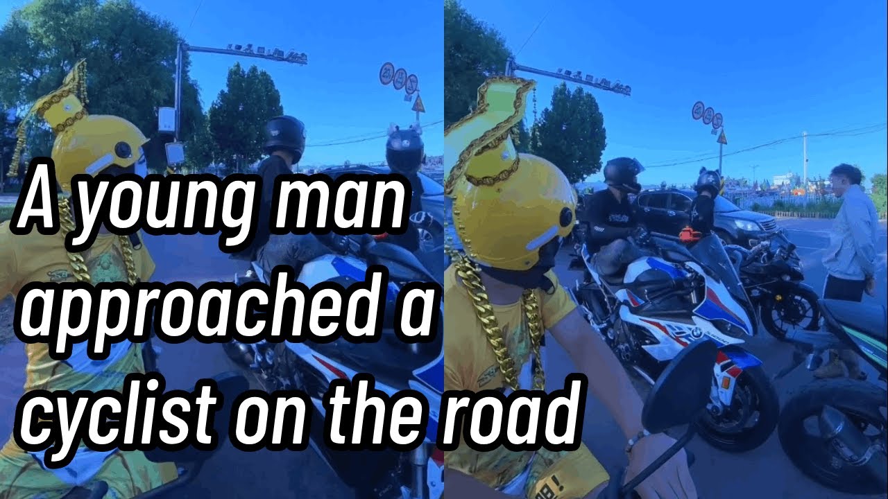 A young man approached a cyclist on the road，The riders were amused
