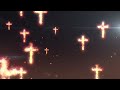 Sacred and majestic crosses rising in golden flames  4k looping