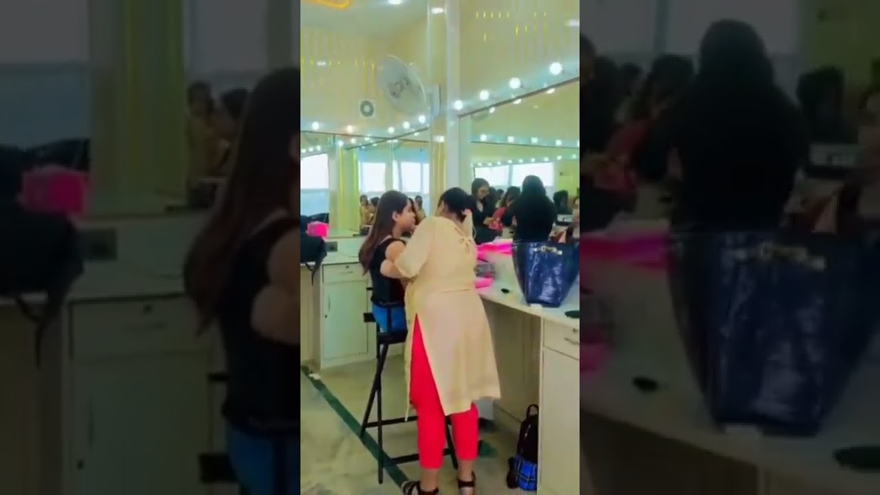 Student Practicing Makeup on Live Models