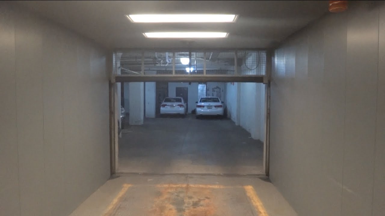 Riding a Car Elevator in an Underground Parking Garage! YouTube