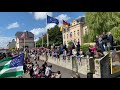 NYPD Pipes and Drums marching into St Mere Eglise in Normandy, France D-Day parade 2019