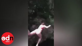 Woman who pushed friend off bridge in viral video sentenced