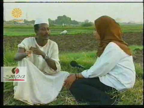 المذيعه ندى سيد كامل ولقاء مع المزارع علي جمعه عبدالرحيم 2000