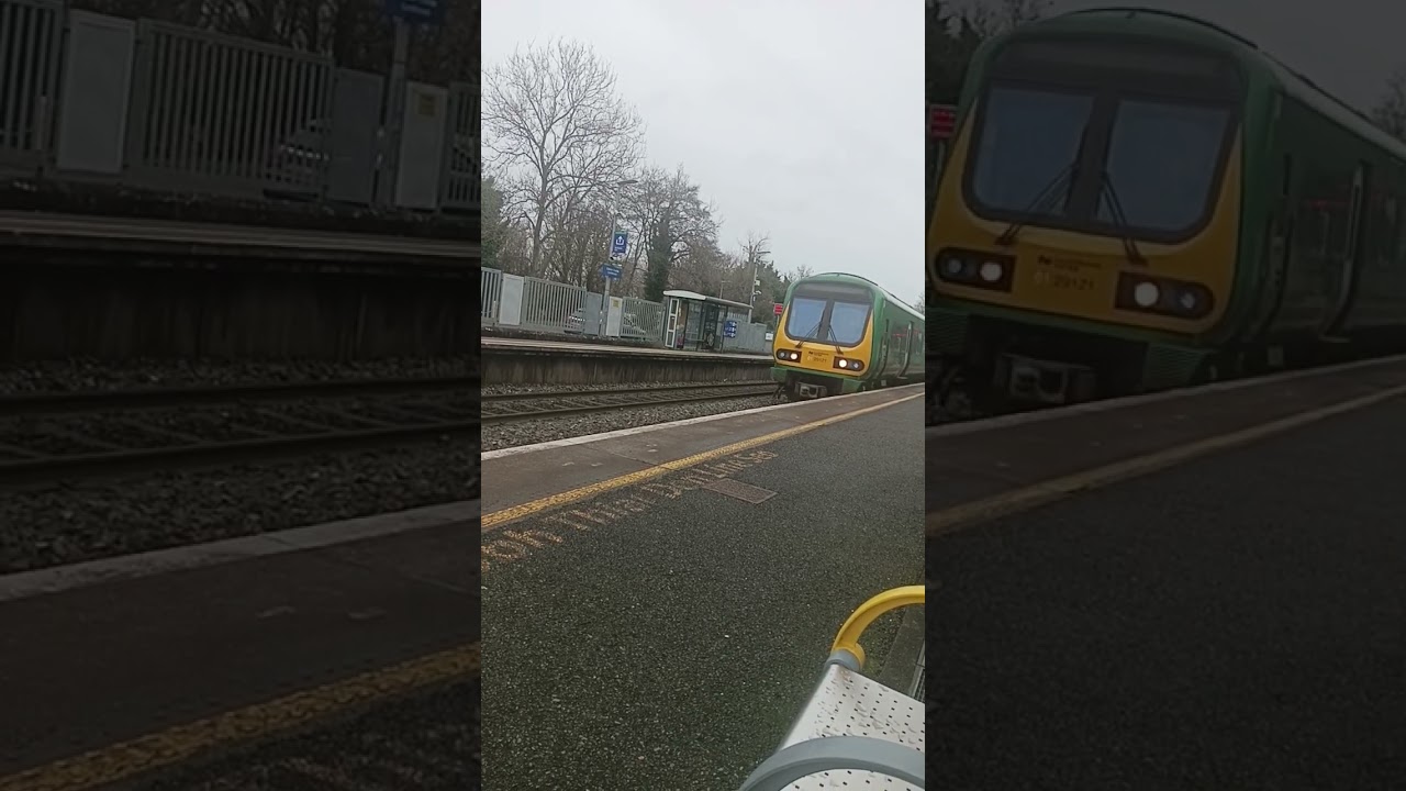 train arrives at Castleknock station Dublin