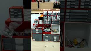 My wall of various size stackable resistor storage boxes!