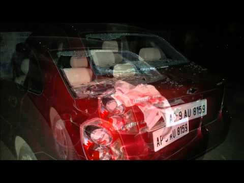 a-motorcycle-crashes-onto-my-car---chevy-optra.