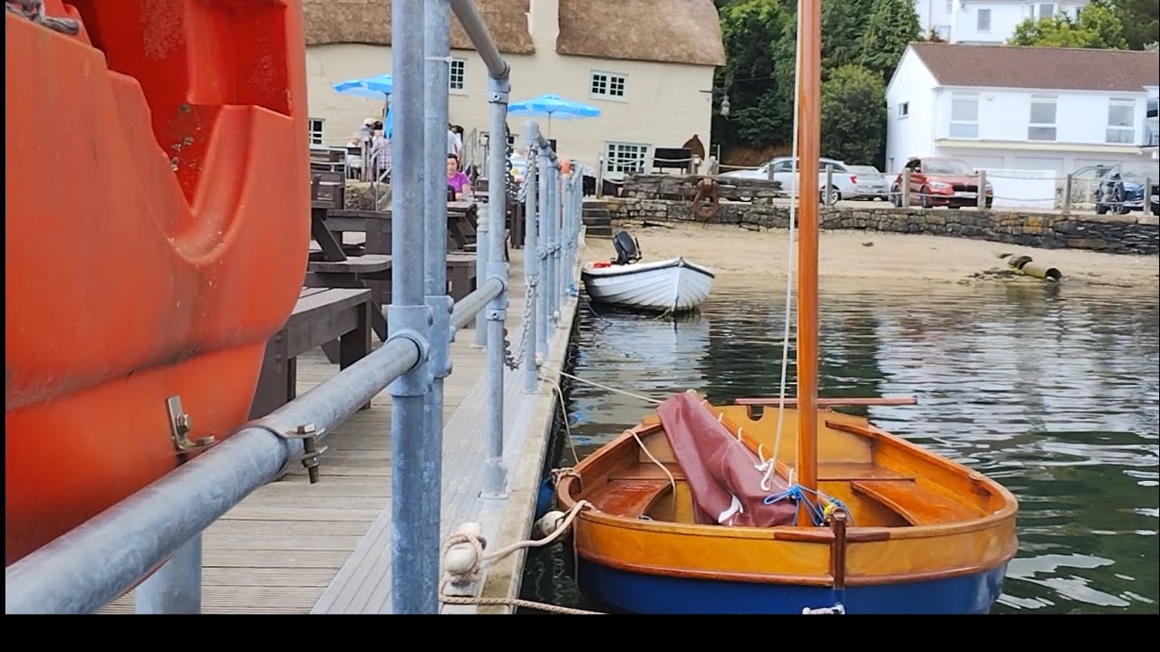 Sailing my little wooden dinghy to the pub