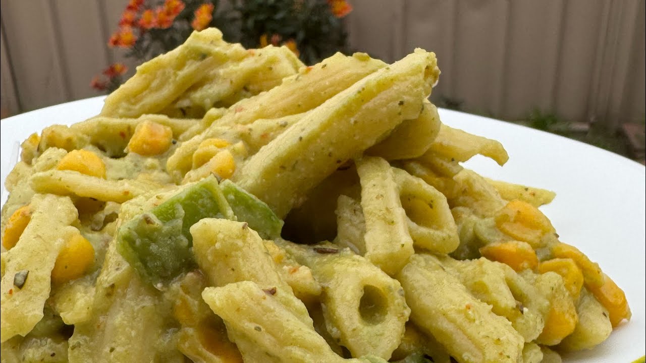 Veg creamy pasta in broccoli  sauce 