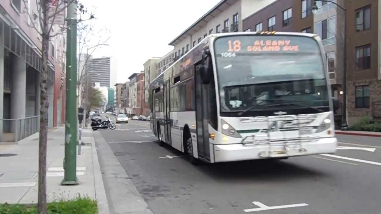 AC TRANSIT Van Hool A330 1064 on route 18 In Downtown Oakland