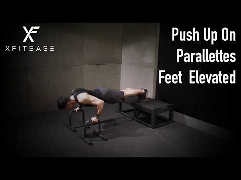Push Up On Parallettes Feet Elevated . Xfitbase FBB Exercise Demo