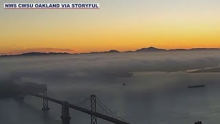 Timelapse catches low lying clouds drift over the San Francisco Bay