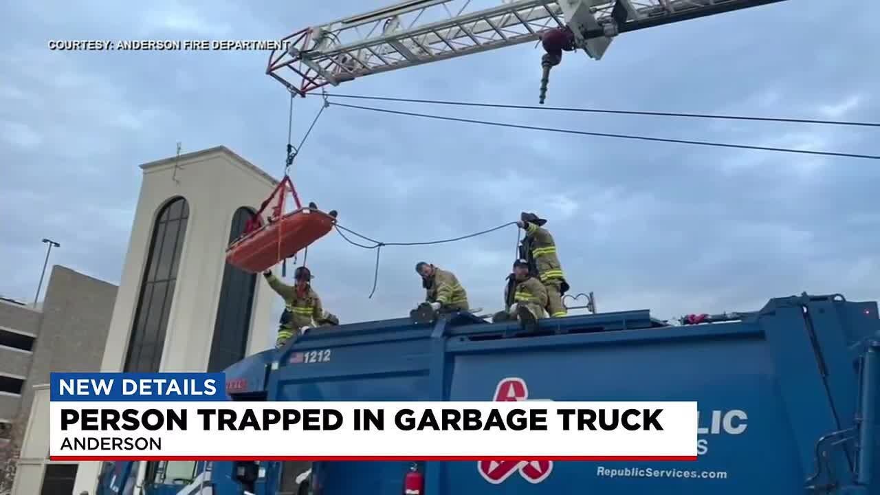 Person trapped in garbage truck in Anderson