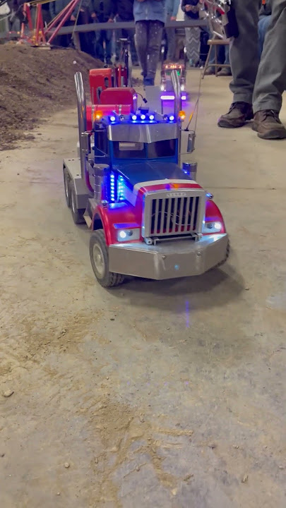 Custom built Tamiya RC trucks driving around at Cabin Fever Expo