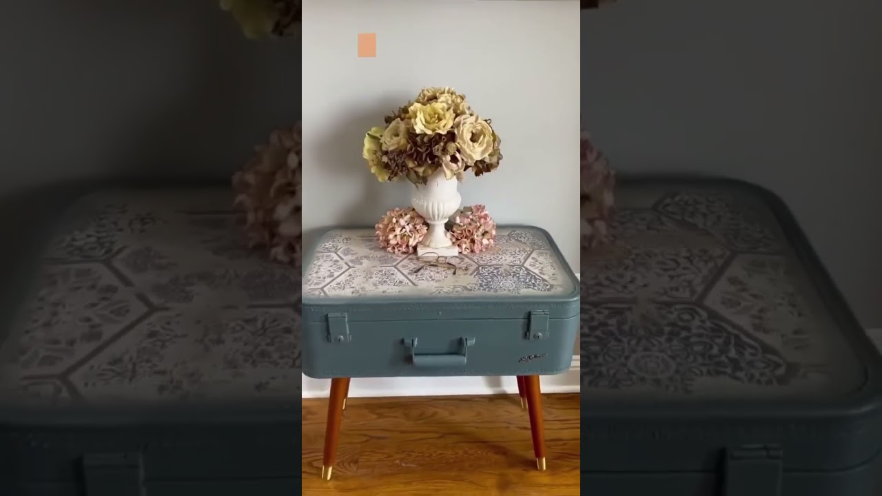 Decoupaged suitcase.  