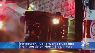 Pittsburgh DPW Truck Flips Onto Side After Crash On The North Side screenshot 3
