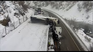I-70 closed at Glenwood Canyon as Semi truck dangles off westbound side