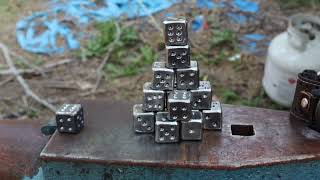forged metal dice
