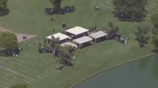 AERIALS: Funeral procession for 10 flash flood victims
