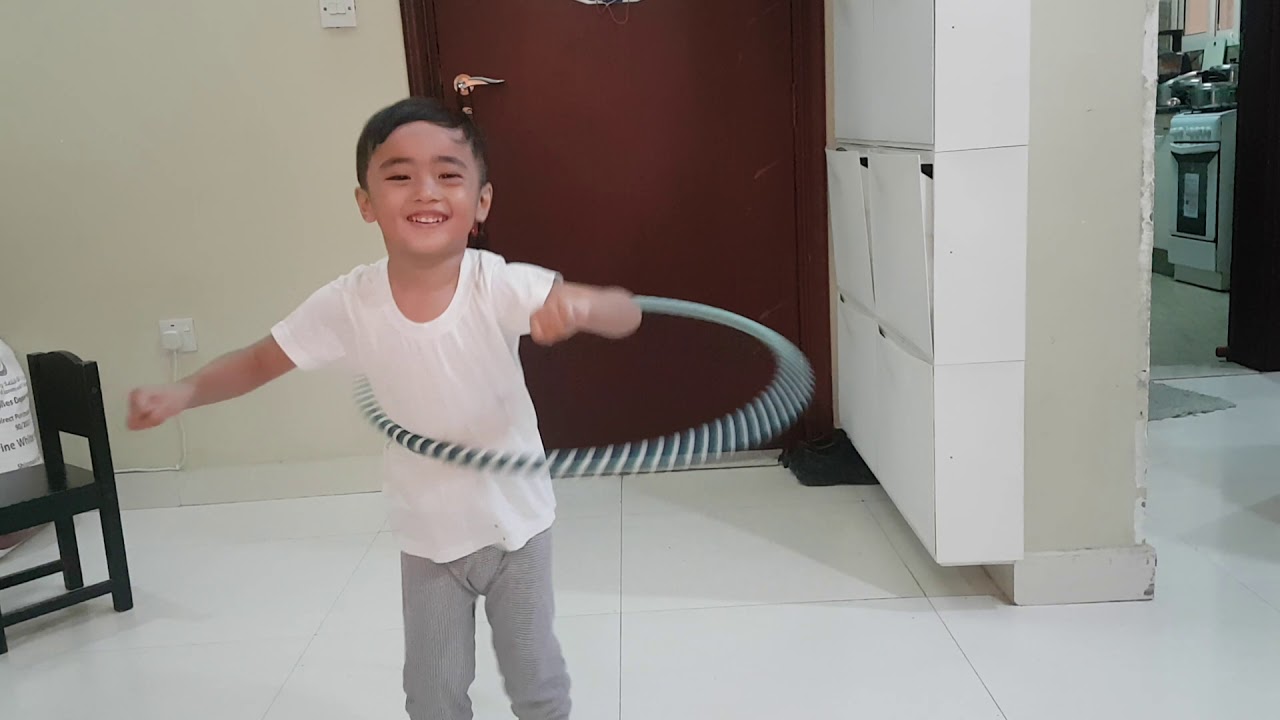 KAN Ferry Tales NJ 3yrs old playing hoola hoop